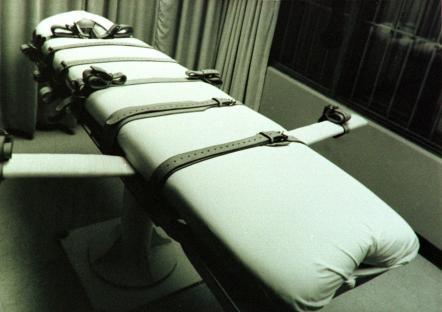 Lethal injection gurney in a prison death chamber.