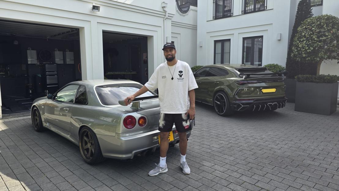 Reece James with his new Nissan Skyline R34 and a Lamborghini Urus.