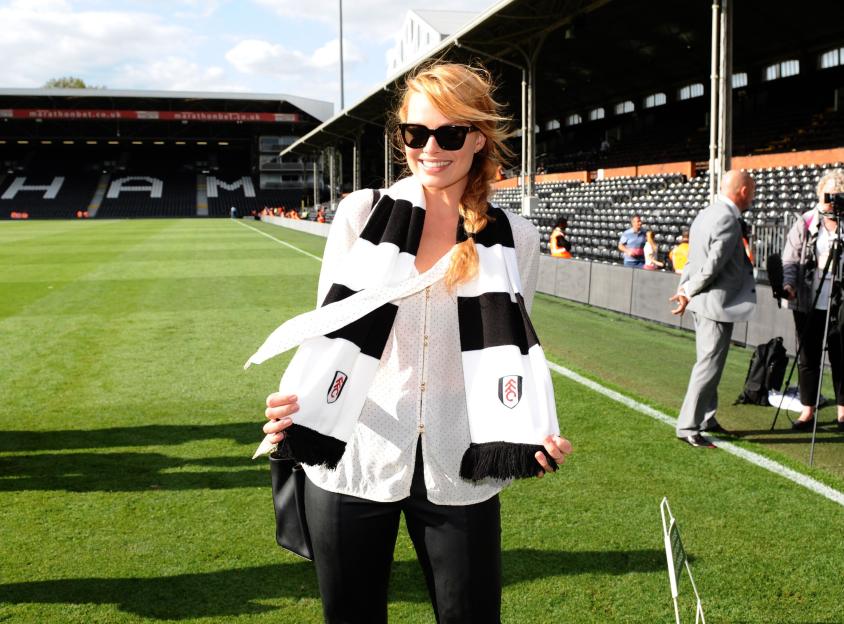 Margot Robbie with a Fulham scarf at Craven Cottage.