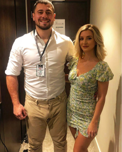 Photo of a man and woman standing together.