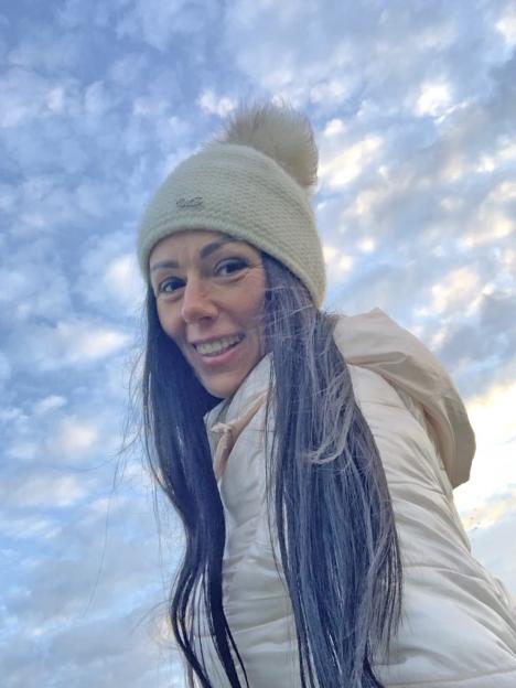 Eva Komuves, 48, pictured outdoors.