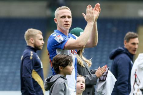 Adam Forshaw of Blackburn Rovers applauding after a match.