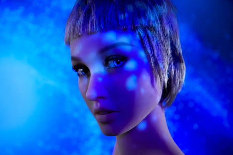 Close-up of a mannequin's face illuminated with blue light.