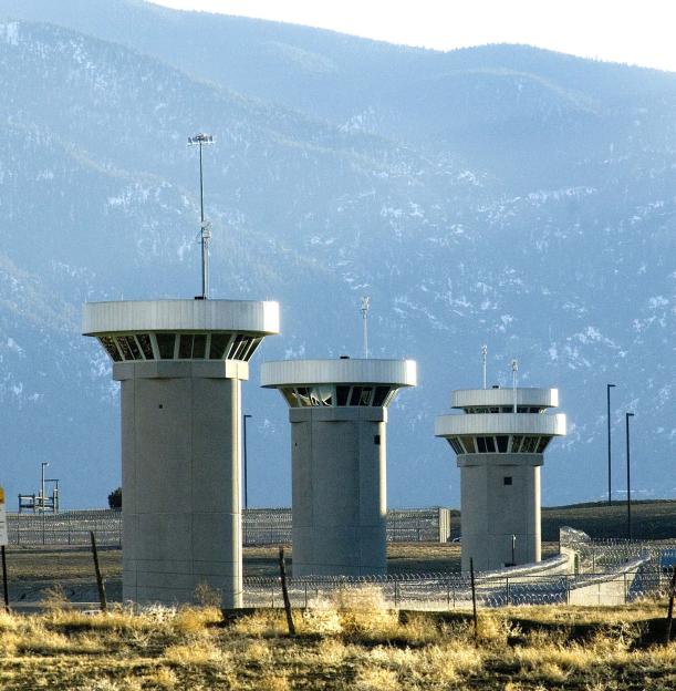 Three guard towers at a maximum-security prison.