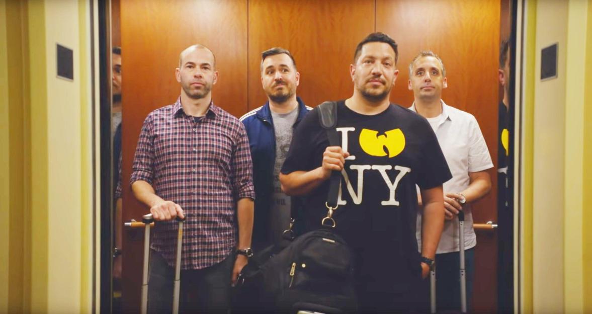 The Impractical Jokers cast in an elevator.