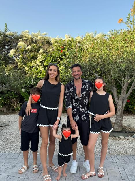 Family photo of Peter and Emily Andre with their children.