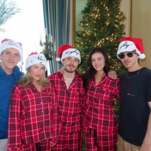 Brooklyn Beckham and Nicola Peltz with family at Christmas.
