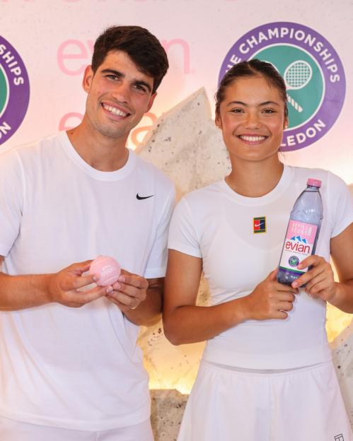 Carlos Alcaraz and Emma Raducanu at an Evian event.