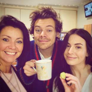 Harry Styles with his mother and sister.
