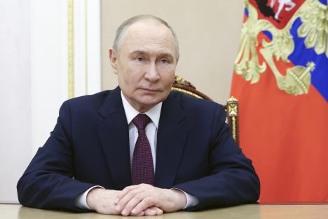 Vladimir Putin recording a video address.