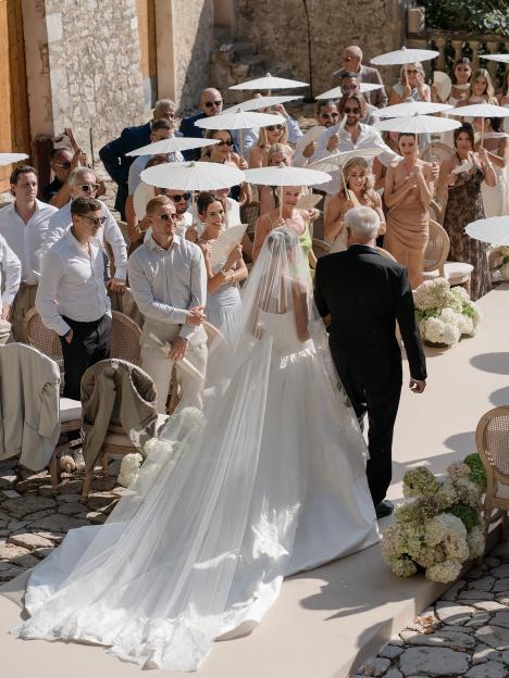 Bride walking down the aisle at her wedding.