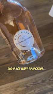 A bottle of Monallie Côtes de Provence rosé wine.