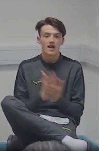 Young man clapping his hands.