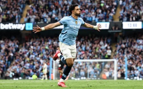 Omar Marmoush of Manchester City celebrating a goal.