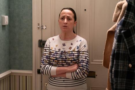Sonia Fowler from EastEnders with arms crossed.