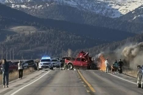 Rescue workers at the scene of a deadly car accident.