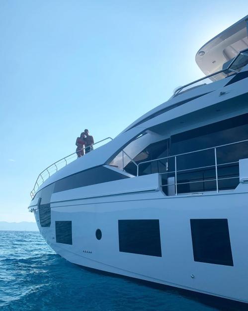 Couple on a yacht.
