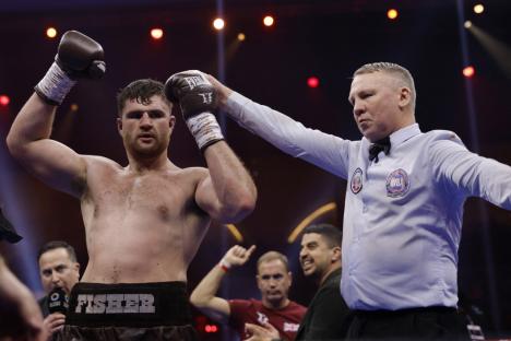 Boxing - Oleksandr Usyk v Tyson Fury - Heavyweight World Title - Kingdom Arena, Riyadh, Saudi Arabia - December 21, 2024 Johnny Fisher celebrates after winning his fight against Dave Allen Action Images via Reuters/Andrew Couldridge
