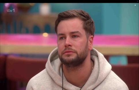 Chris Hughes receiving a letter from home on Celebrity Big Brother.