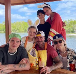 The Beckham family posing for a photo.