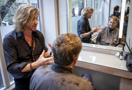 Mel Stride getting a haircut and discussing national insurance with hairdressers Nicky and Michael Clarke.