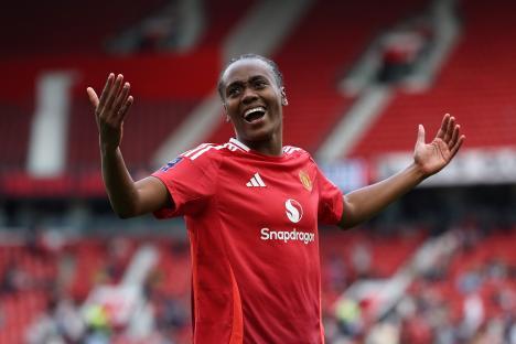 Melvine Malard of Manchester United celebrating a goal.