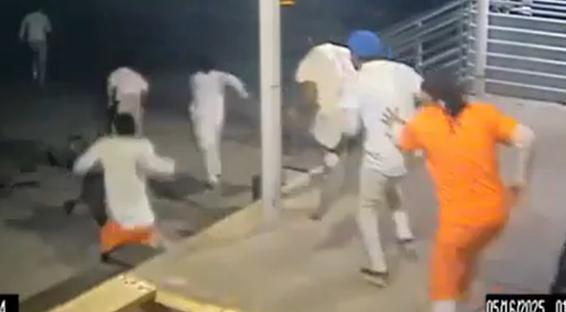 Security footage of multiple prisoners escaping from a jail.