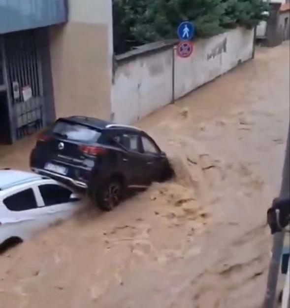 Italy floods: Schoolkids rescued as wave of torrential rainfall smashes northern towns and rivers burst their banks
