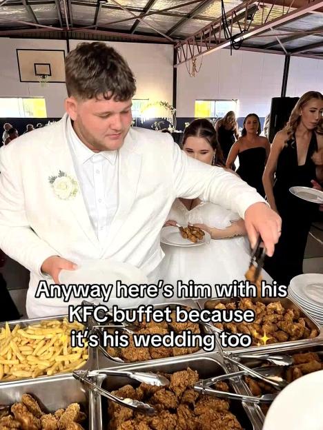Groom at wedding serving KFC buffet.