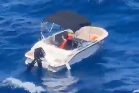 Incredible moment missing Brit castaway Mary Gavin waves desperately at passing ship sparking rescue after 5 days at sea