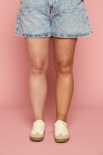 Before and after tanner application on legs.