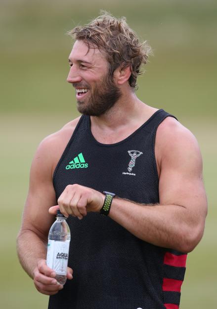 Chris Robshaw of Harlequins drinking water during training.