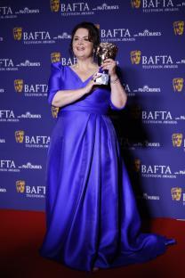 Ruth Jones accepting a BAFTA award.