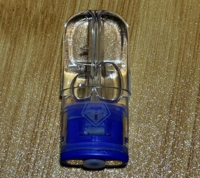 Clear vape cartridge with blue base.
