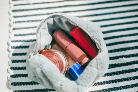 Makeup bag with cosmetics.