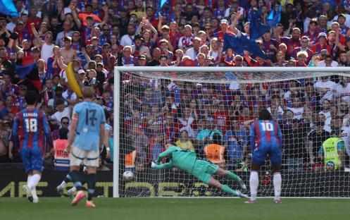 Manchester City's Omar Marmoush's penalty shot being saved.