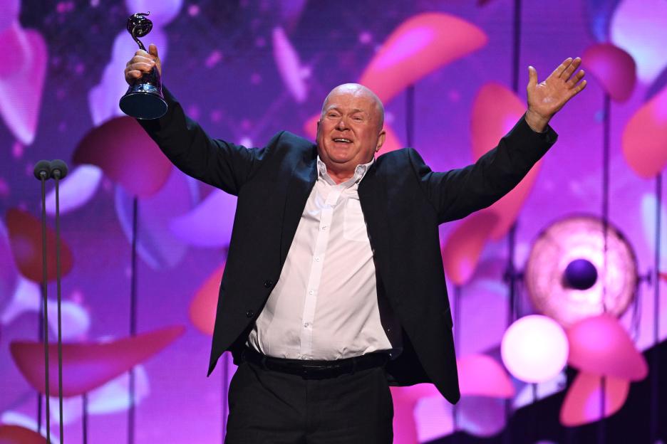 Steve McFadden accepting a Serial Drama Performance award.