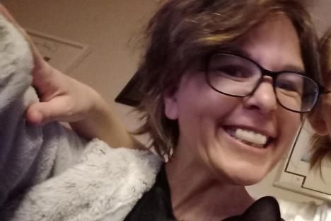 Woman, 45, stabbed to death at London flat named as man, 29, arrested on suspicion of murder