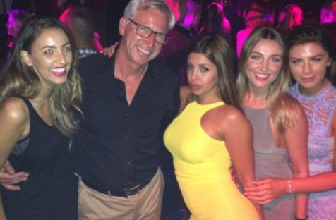 Alan Pardew with four women in a nightclub.