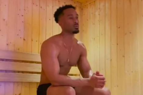 Love Island hunk sparks feud with show ex as he takes swipe at her while stripping down for sauna video