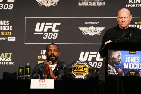 Jon Jones and UFC President Dana White at a press conference.