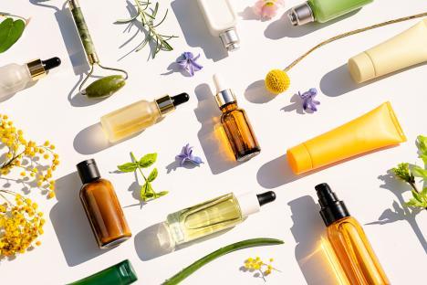Trendy Collage made of Natural Cosmetics and Beauty Products for Body and Face Care with leaves and flowers. The best gift for Valentine's Day. Holiday's, birthday, International women's day, Mother day, love, party concept. Copy space. Flat lay.