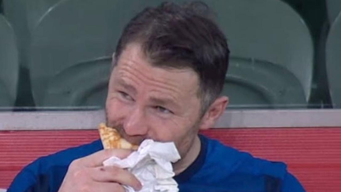 ‘No respect’ – Sports star eats KEBAB on the bench after being subbed off during horribly one-sided victory over rivals