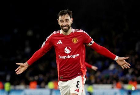 FILE PHOTO: Soccer Football - Premier League - Leicester City v Manchester United - King Power Stadium, Leicester, Britain - March 16, 2025 Manchester United's Bruno Fernandes celebrates scoring their third goal REUTERS/Chris Radburn EDITORIAL USE ONLY. NO USE WITH UNAUTHORIZED AUDIO, VIDEO, DATA, FIXTURE LISTS, CLUB/LEAGUE LOGOS OR 'LIVE' SERVICES. ONLINE IN-MATCH USE LIMITED TO 120 IMAGES, NO VIDEO EMULATION. NO USE IN BETTING, GAMES OR SINGLE CLUB/LEAGUE/PLAYER PUBLICATIONS. PLEASE CONTACT YOUR ACCOUNT REPRESENTATIVE FOR FURTHER DETAILS../File Photo