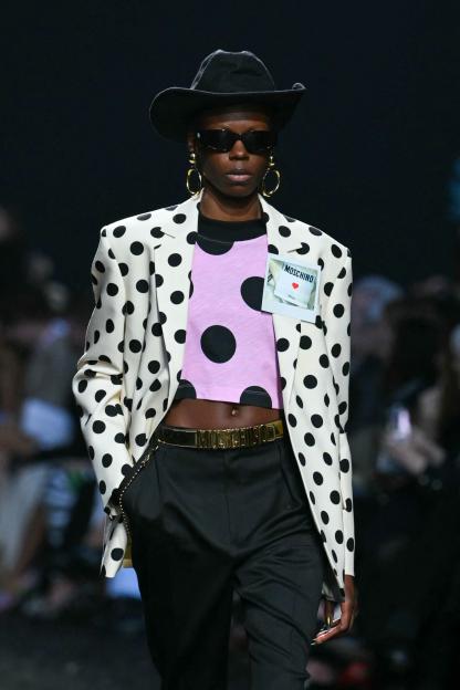 Model in polka dot Moschino outfit.