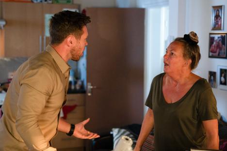 Keanu Taylor and Karen Taylor arguing in a room.