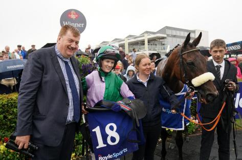 Hallowed Star with jockey Rachael Blackmore and winning trainer John Joseph Hanlon (left) after winning the BoyleSports Handicap Hurdle during day six of the Galway Races Summer Festival 2022 at Galway Racecourse in County Galway, Ireland. Picture date: Saturday July 30, 2022.