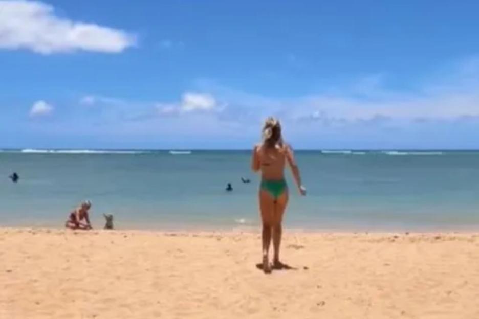 Wheel of Fortune’s Maggie Sajak shows off her fit figure in a cheeky green bikini on Hawaii trip with dad Pat Sajak