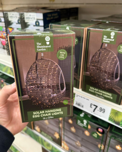 Box of solar-powered hanging egg chair lights with 136 LEDs.