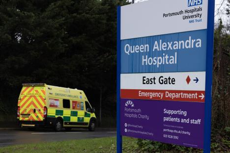 Ambulance leaving Queen Alexandra Hospital emergency department.